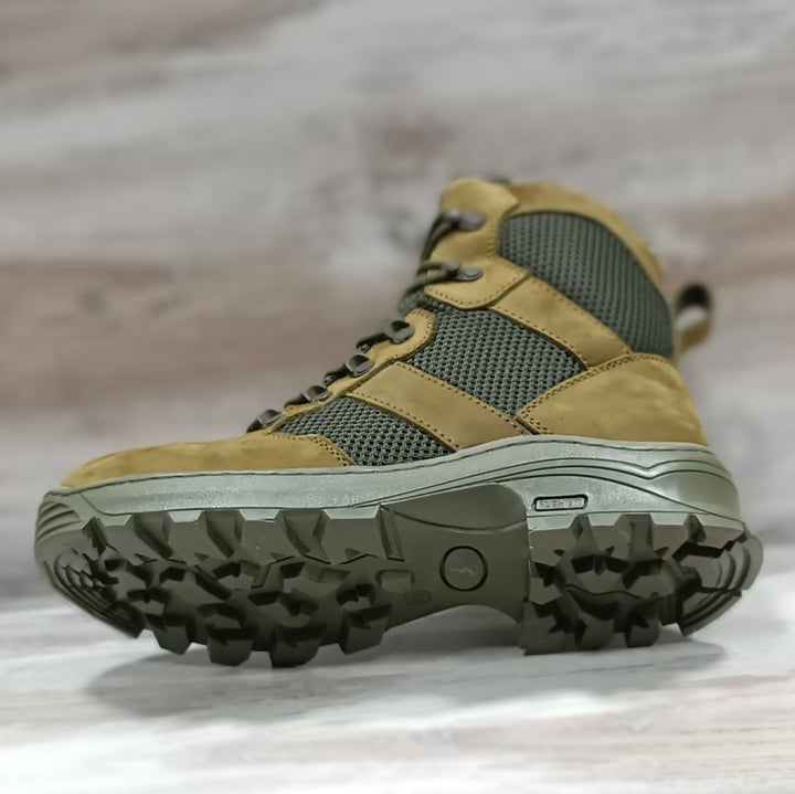 Lightweight olive tactical boots with aggressive trekking outsole and breathable mesh panels, designed for military or hiking use.