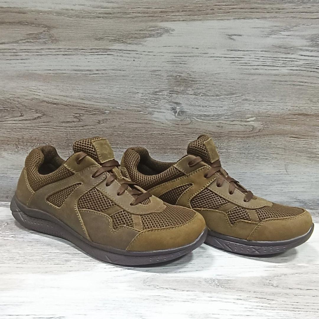 Front and side profile of tactical low-top sneakers with mesh panels and leather overlays