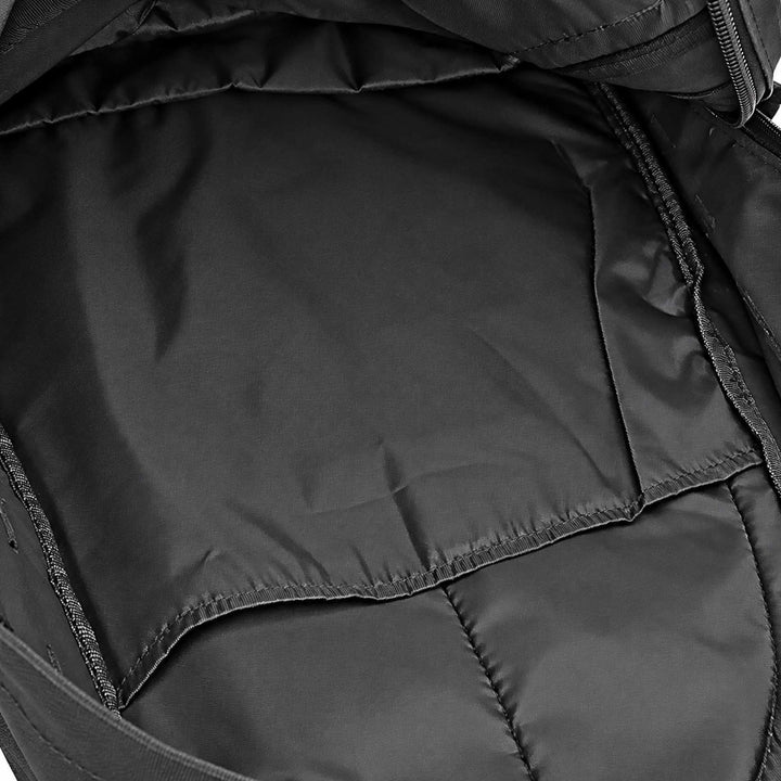 Black 30L tactical backpack with an open main compartment, smooth internal lining, large divider pocket, reinforced seams, and zippered opening.