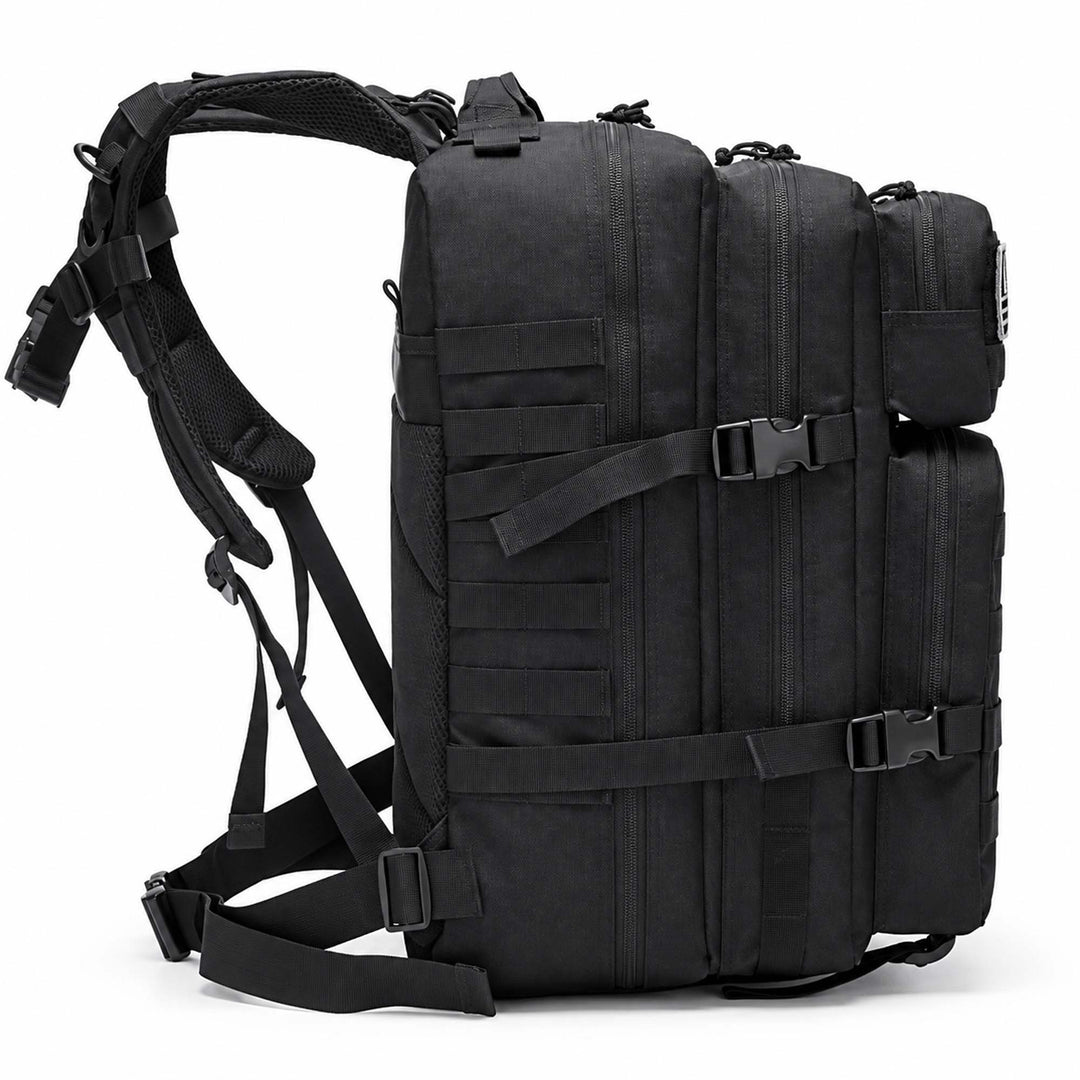 Black 50L military backpack shown from the side with multiple zippered compartments, MOLLE webbing, compression straps, and padded shoulder straps.