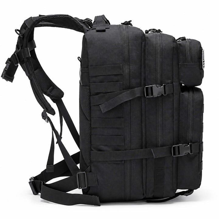 Black 50L military backpack shown from the side with multiple zippered compartments, MOLLE webbing, compression straps, and padded shoulder straps.