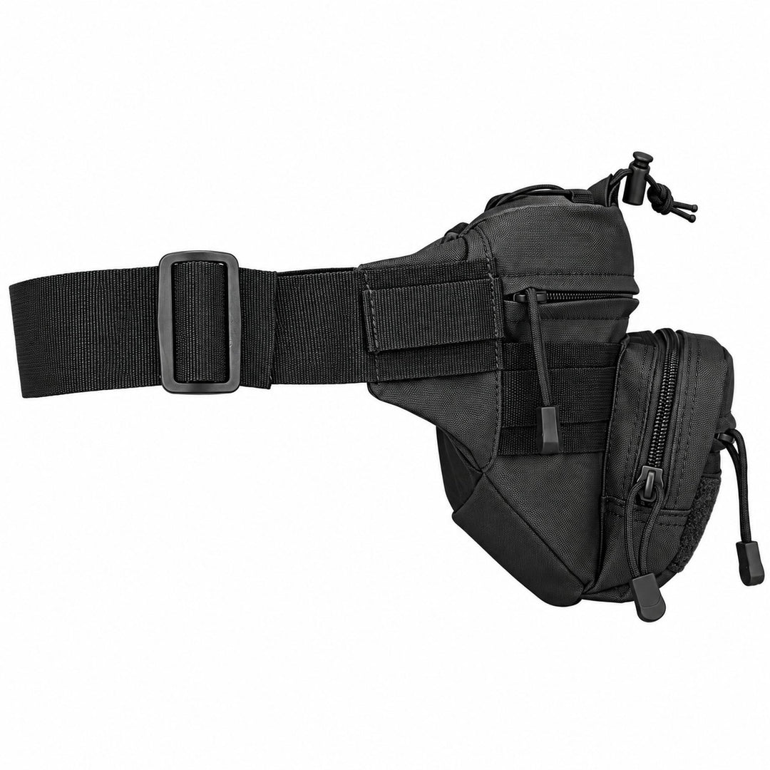 Black tactical fanny pack from the side showing MOLLE webbing, front zippered pouch, adjustable waist belt, and elastic gear cord on top.