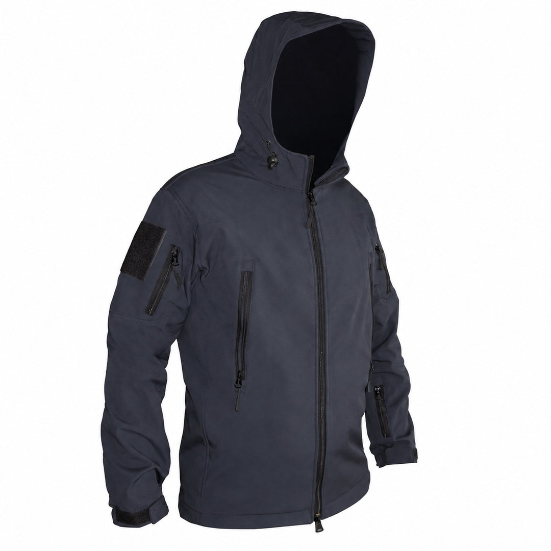 Dark blue hooded softshell jacket shown from a three-quarter angle, displaying the high collar, adjustable hood, front zip pockets, upper-arm pocket, sleeve patch panel, and cuff adjustment.