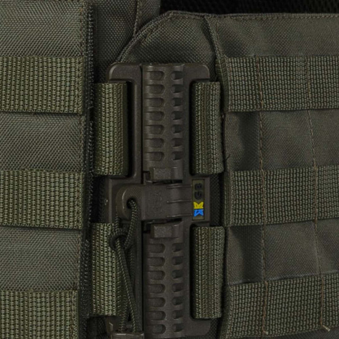 Fast release system on olive plate carrier