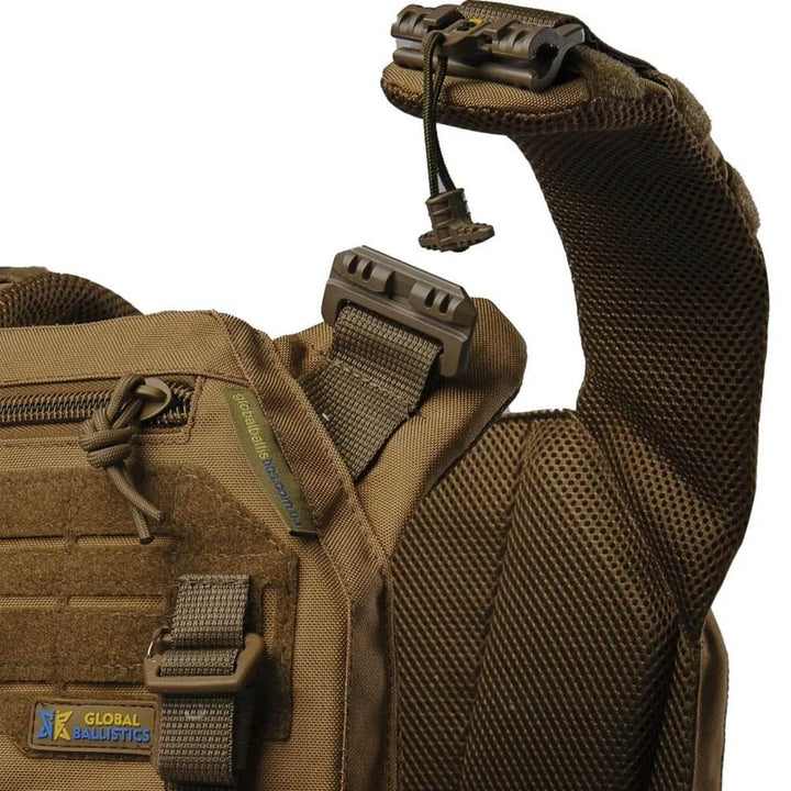 Close-up of coyote plate carrier shoulder strap with padded mesh, adjustable strap, and quick-release buckle