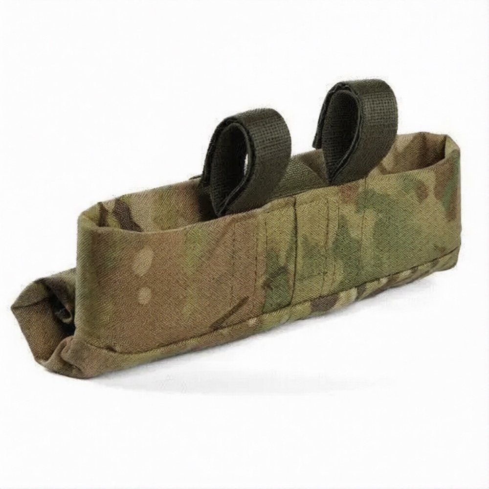 Side view of multicam tactical mag pouch with elastic retention straps