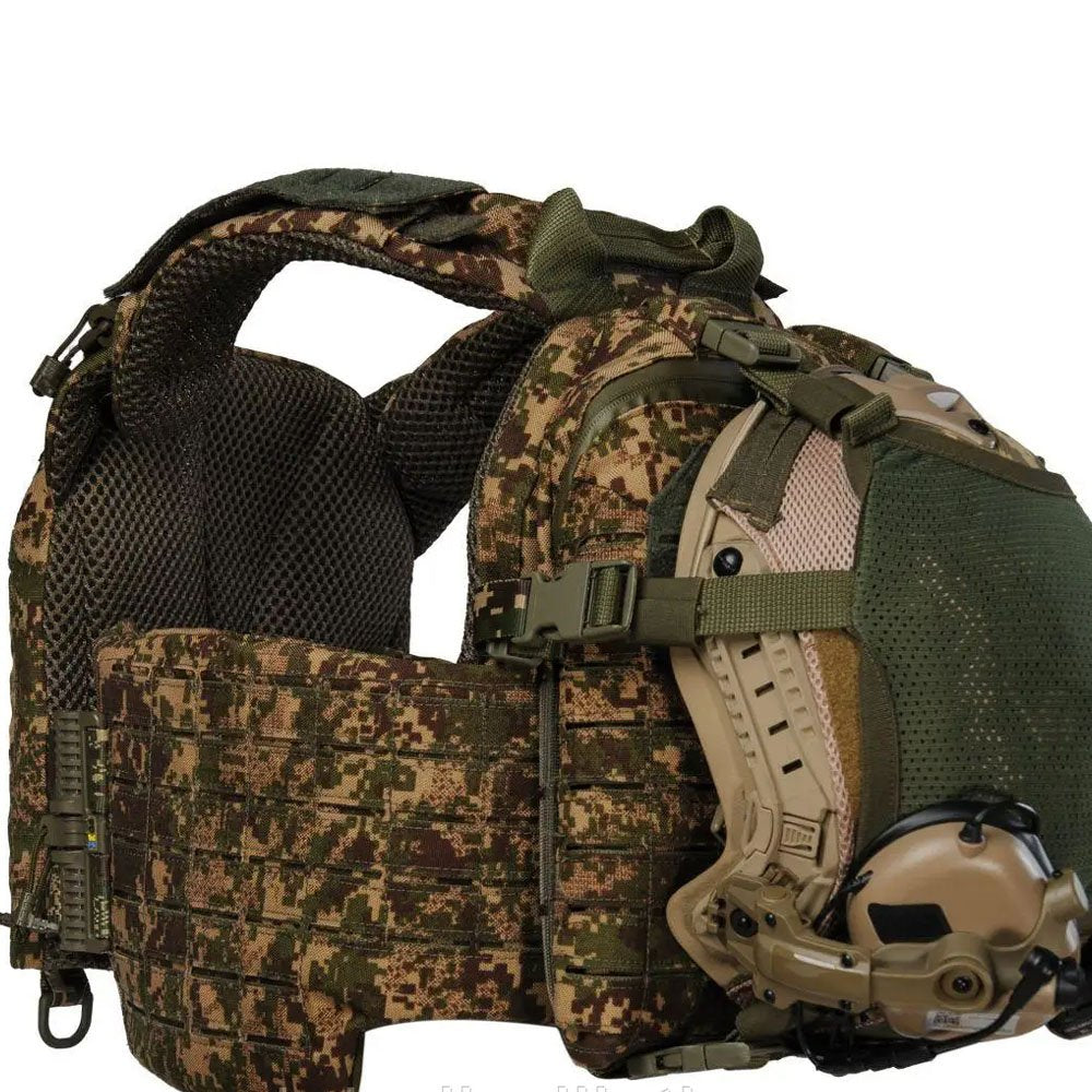 Side section of Predator camouflage tactical vest with mounted helmet holder and reinforced military plate carrier structure