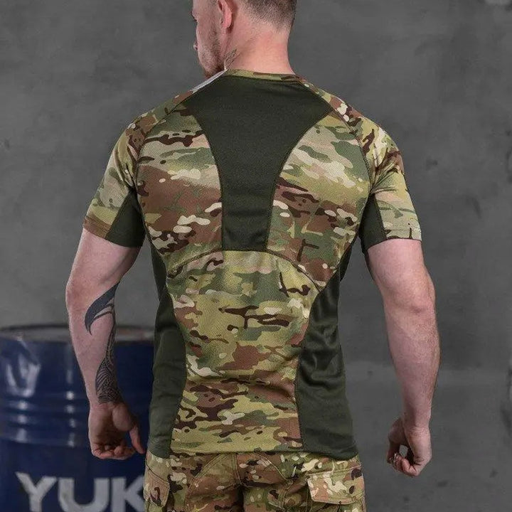 Back view of a man wearing a Multicam tactical t-shirt with mesh panels for improved airflow.