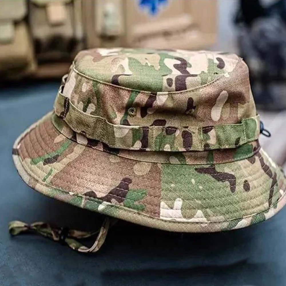 Soldier wearing a Ukrainian Army multicam camouflage panama hat with chin strap.