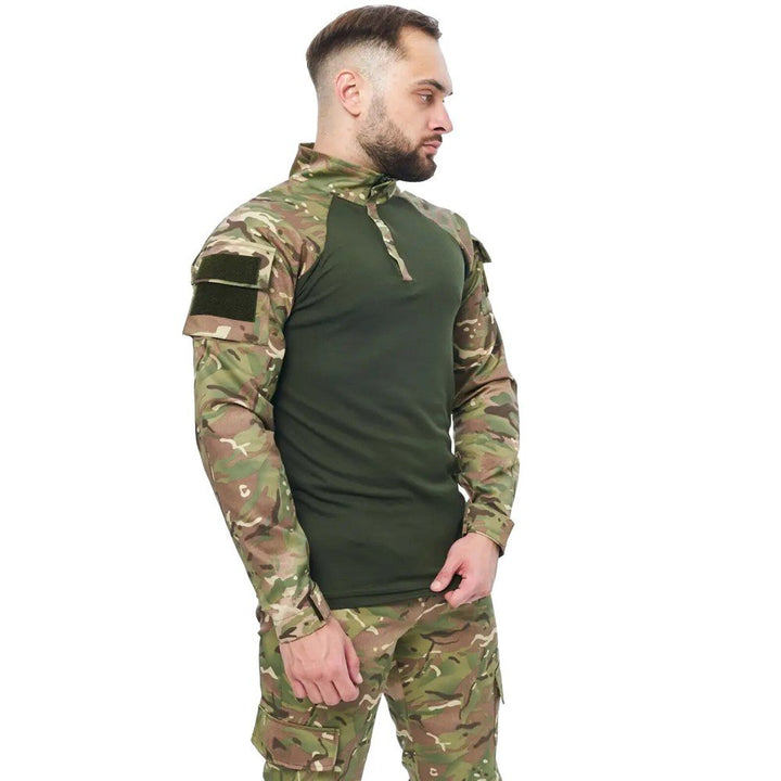 Side view of a man in a multicam UBACS shirt adjusting the Velcro cuff.