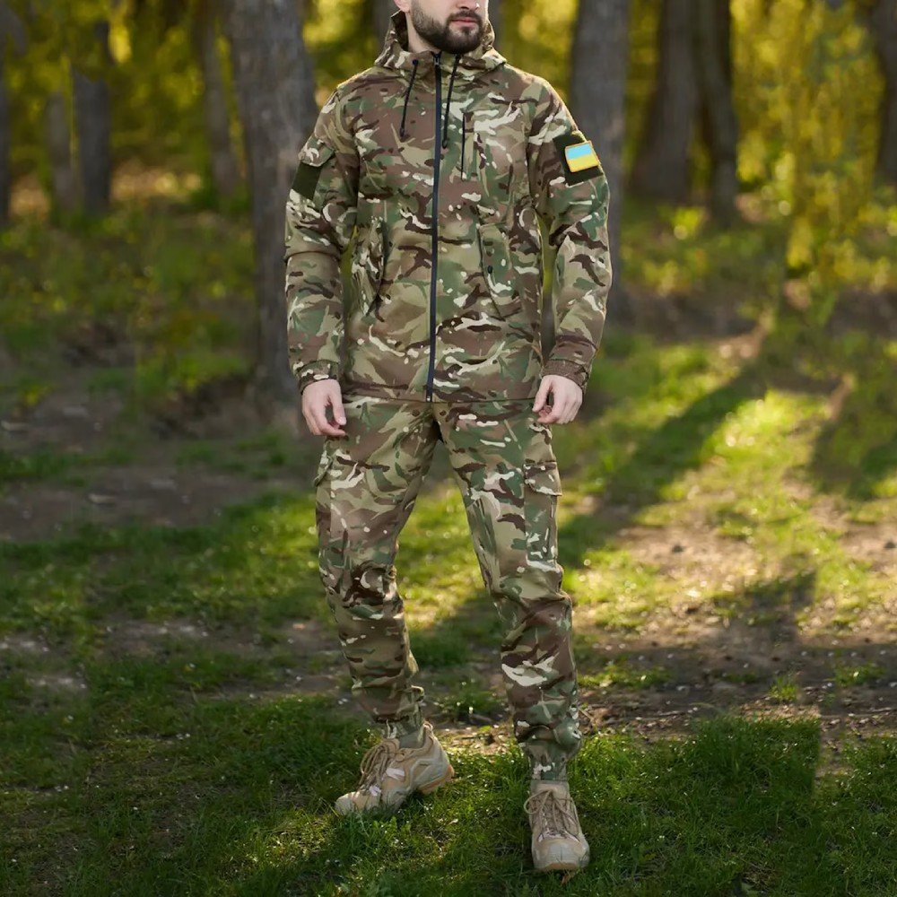 Full-body view of Ukrainian army multicam uniform being worn outdoors, complete with hood and tactical boots.