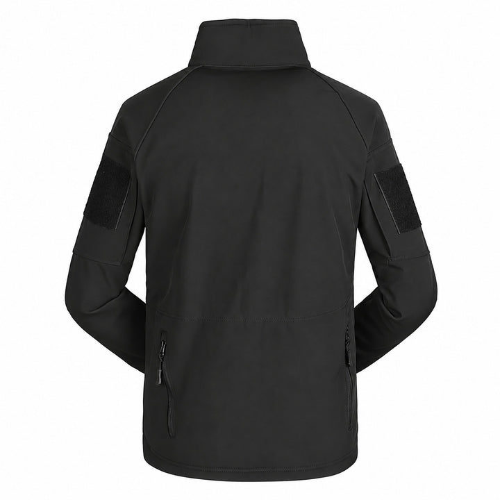 Black tactical softshell fleece jacket shown from the back with high collar, hook &amp; loop panels on both sleeves, shaped shoulder seams, and lower side zippers.