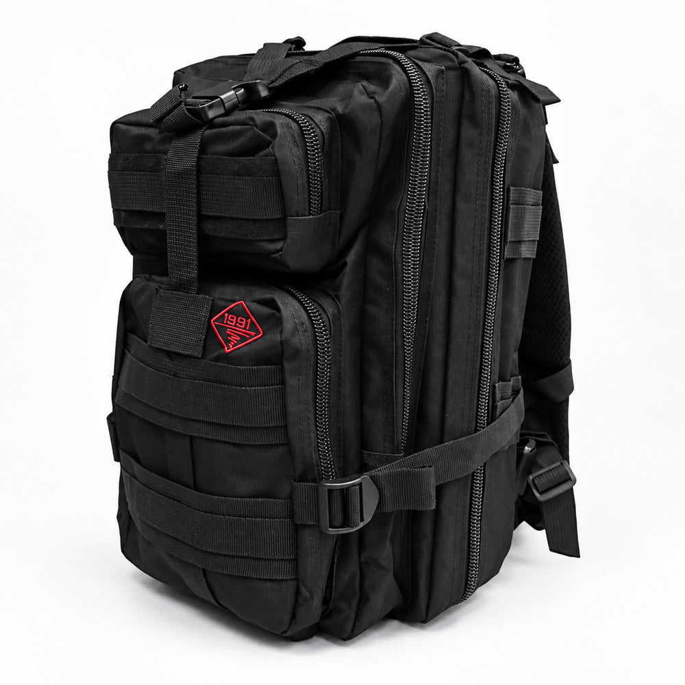 Black 25L tactical backpack with multiple zippered compartments, MOLLE webbing, compression straps, and padded shoulder straps.
