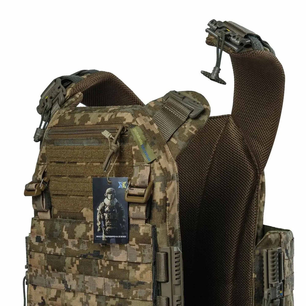 Detailed view of MOLLE system and Velcro patch area on military vest