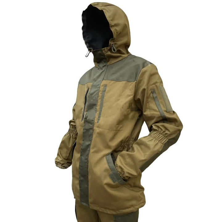 Gorka 5 hooded jacket in olive and grey, hood worn up, from the back.