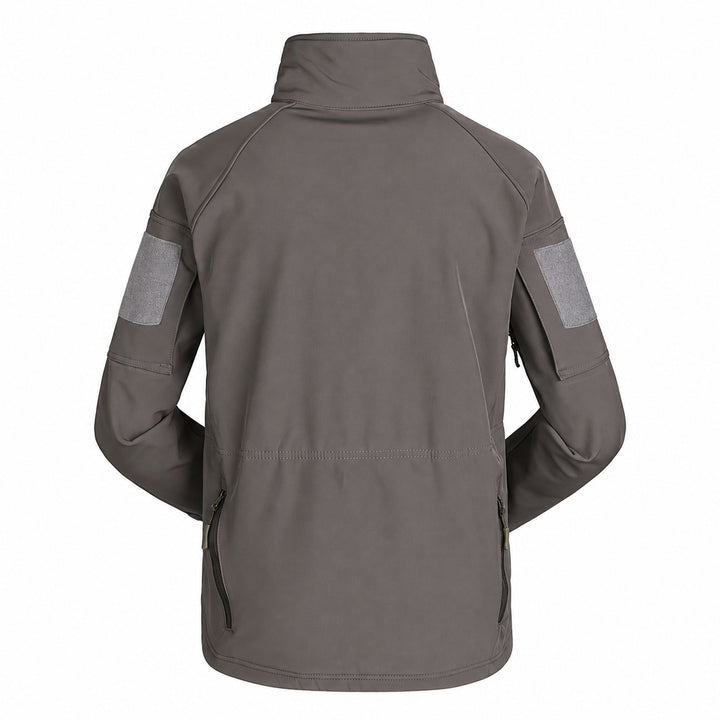 Grey softshell fleece jacket shown from the back with high stand collar, sleeve hook &amp; loop panels, anatomical shoulder construction, and lower side zippers.