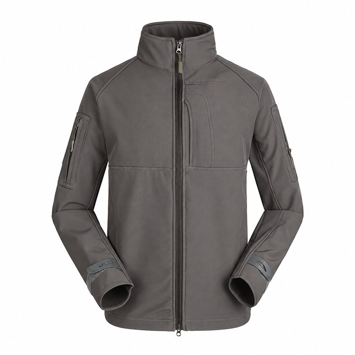 Grey tactical softshell jacket with high collar, full two-way front zipper, zippered upper-arm pockets, shaped chest seams, and adjustable cuffs.