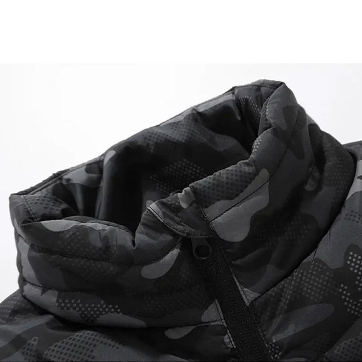 Close-up of the collar area on a black urban camouflage heated vest