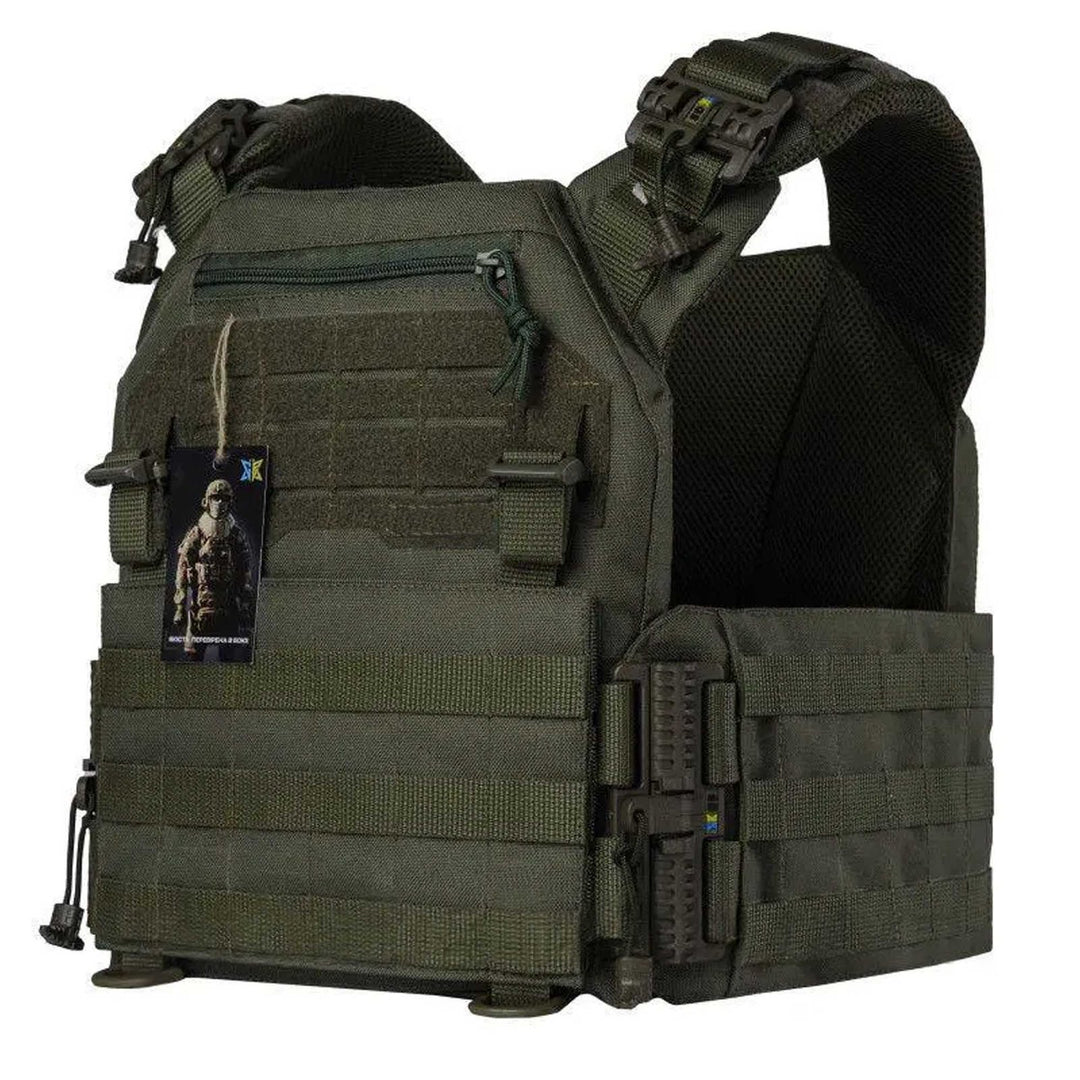 Olive green modular vest angled view showing padded shoulders and tactical gear loops