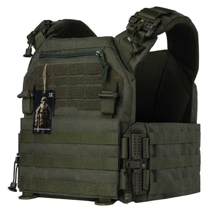 Olive green modular vest angled view showing padded shoulders and tactical gear loops