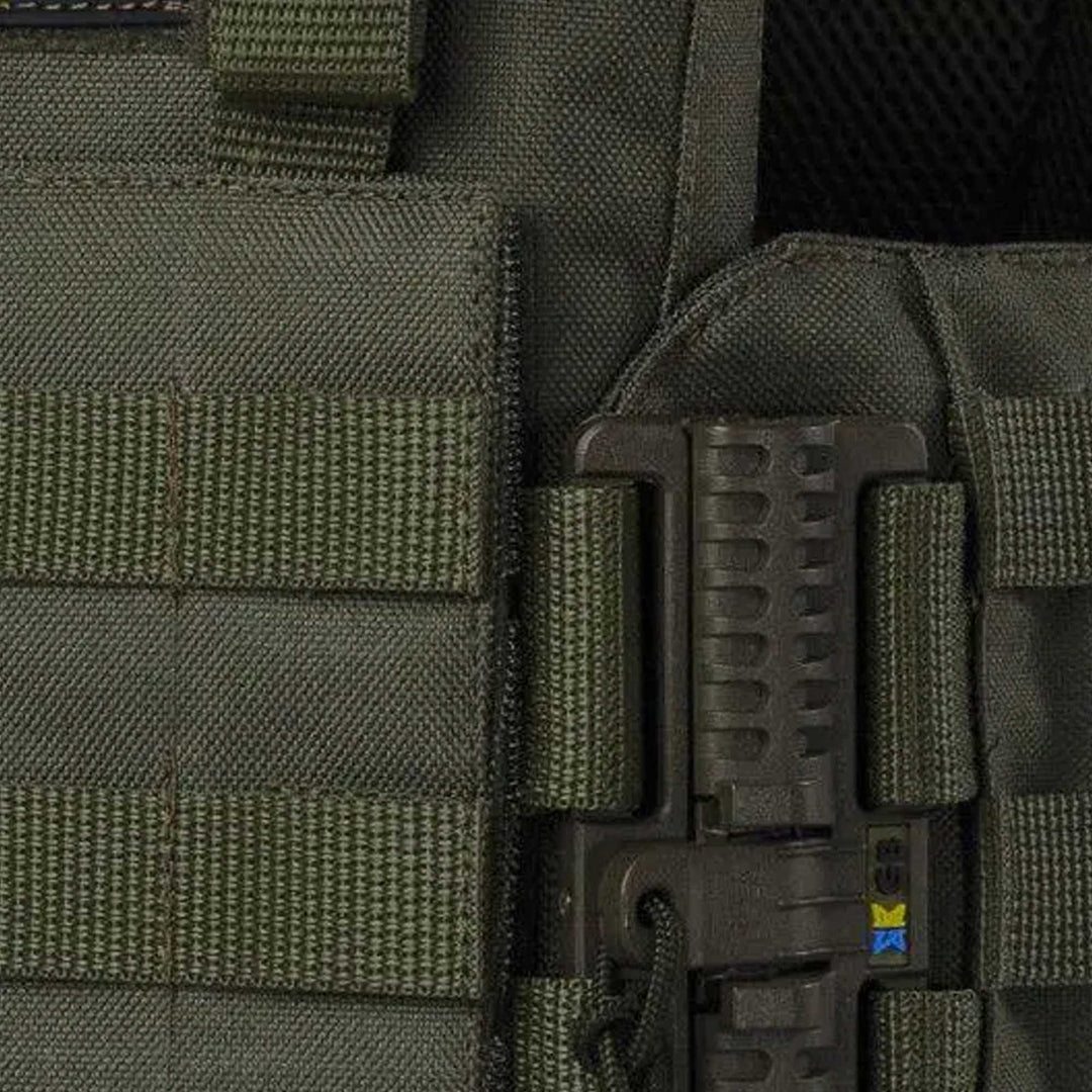 Tactical buckle system close-up on olive side panel