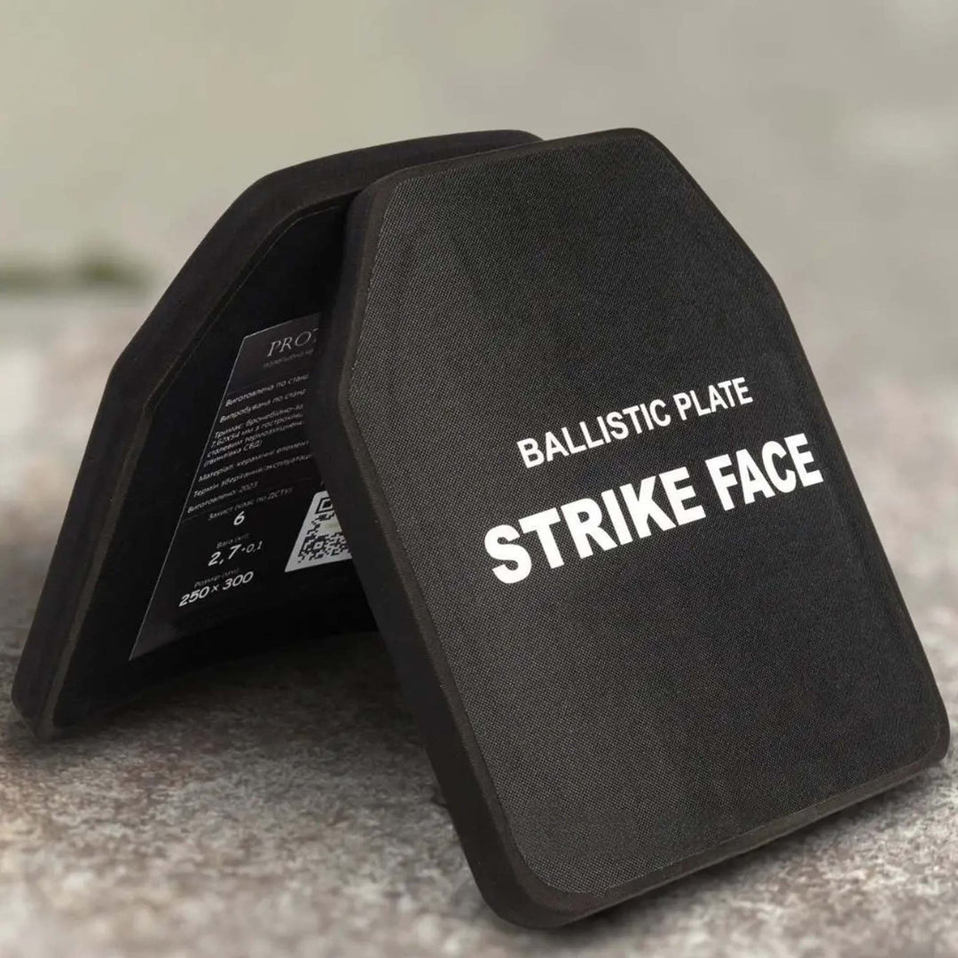 Tactical curved ballistic plates arranged at an angle, showing protective thickness