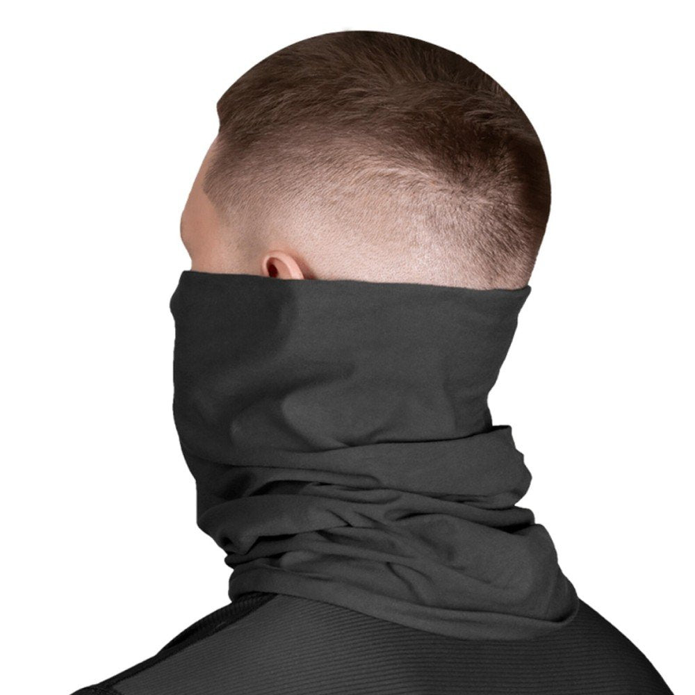 A man wearing a black tactical tube scarf for tactical missions and outdoor activities.