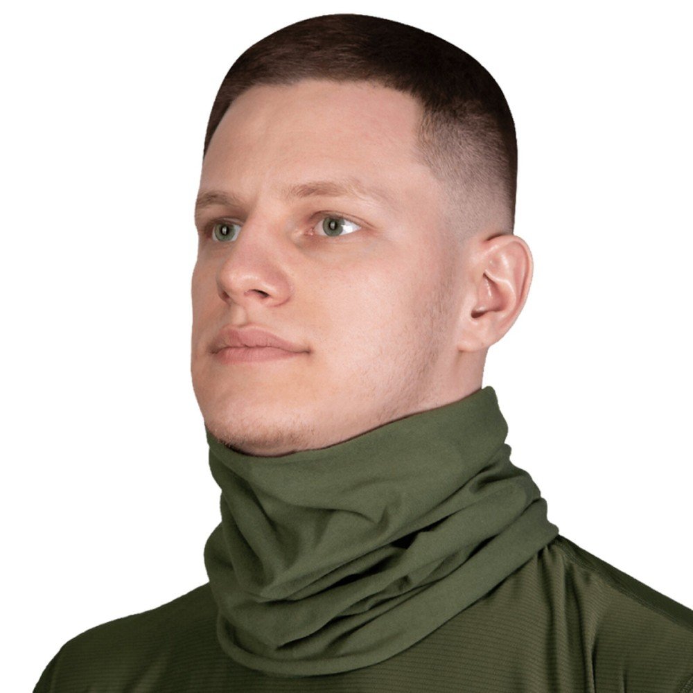 A man wearing an olive green tactical tube scarf for neck and face protection.