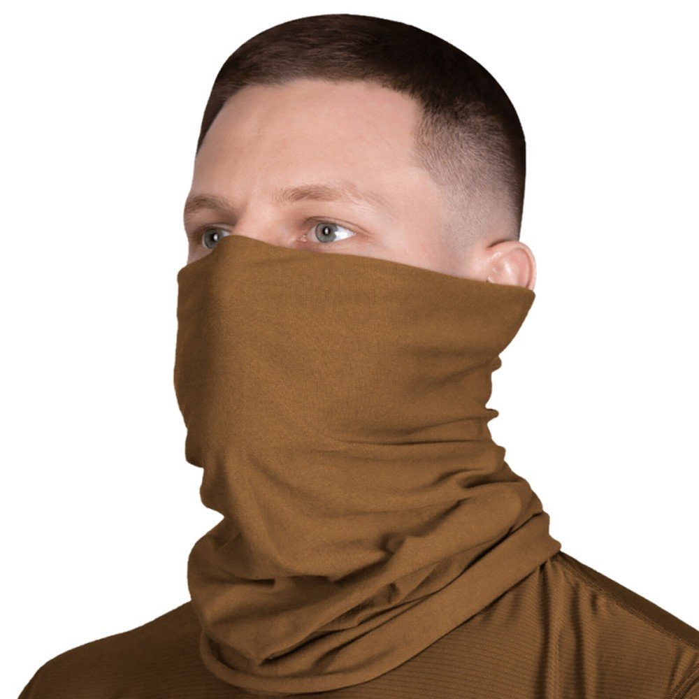 Man wearing a coyote-colored tactical tube scarf for outdoor and military use.