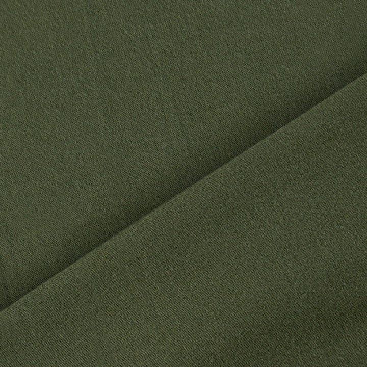 Close-up of the lightweight cotton material used for the olive tactical scarf.