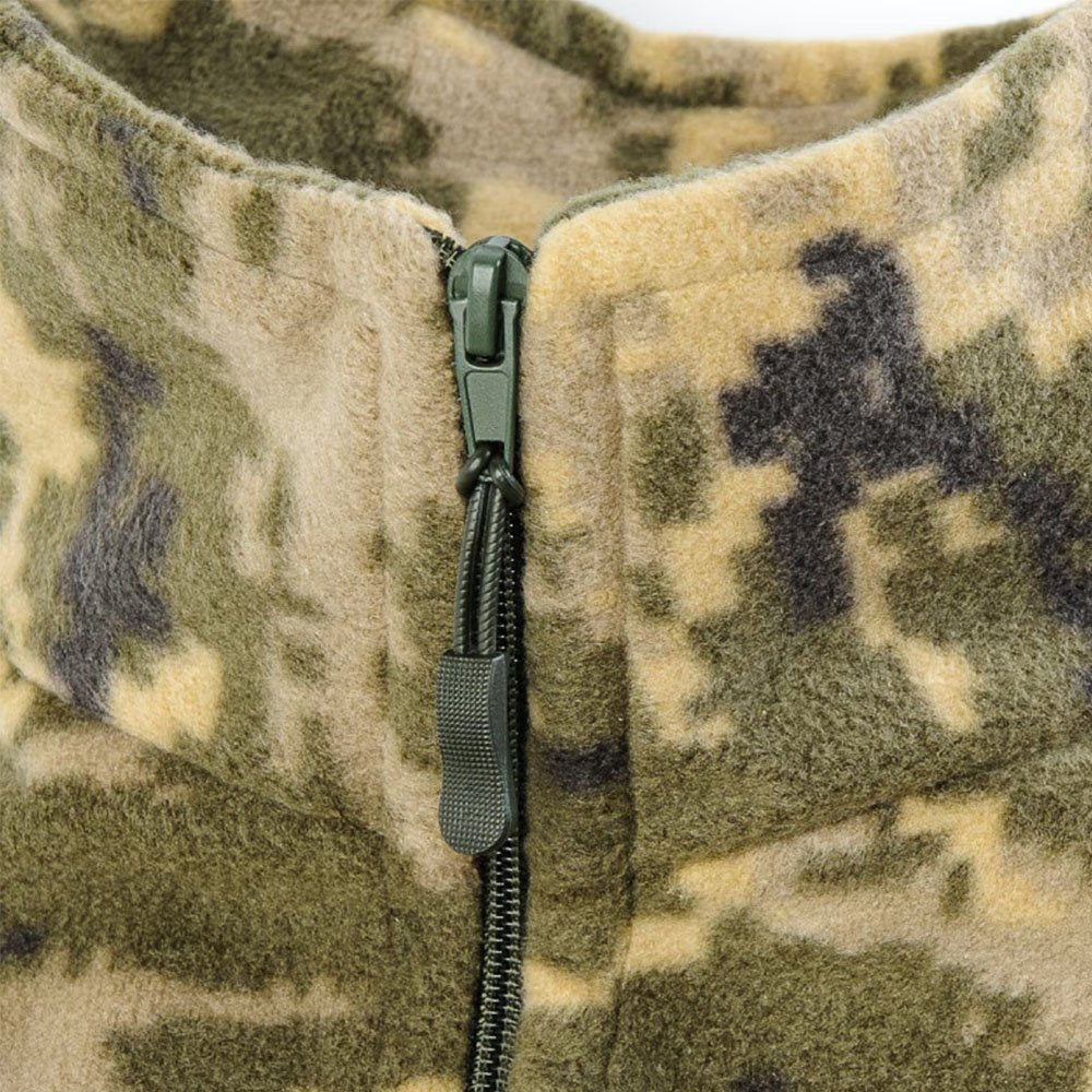 Zipper pull close-up on a tactical camo jacket.