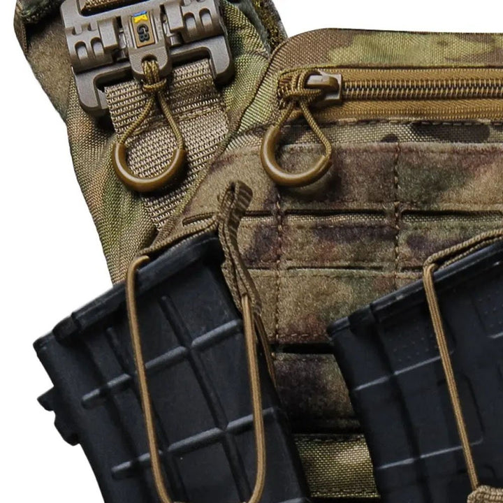 Close-up of multicam tactical vest quick release buckle and admin pocket