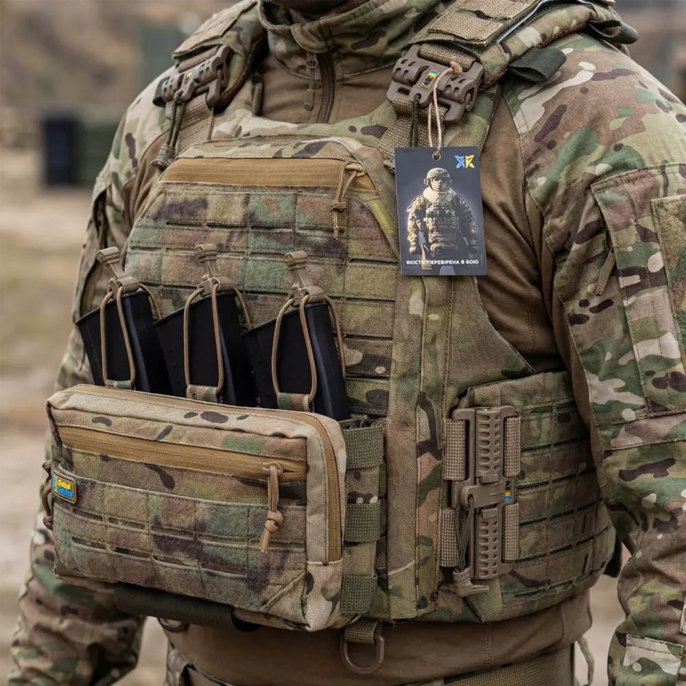 Front view of multicam tactical plate carrier vest with admin pouch, triple mag pouch setup, and MOLLE system