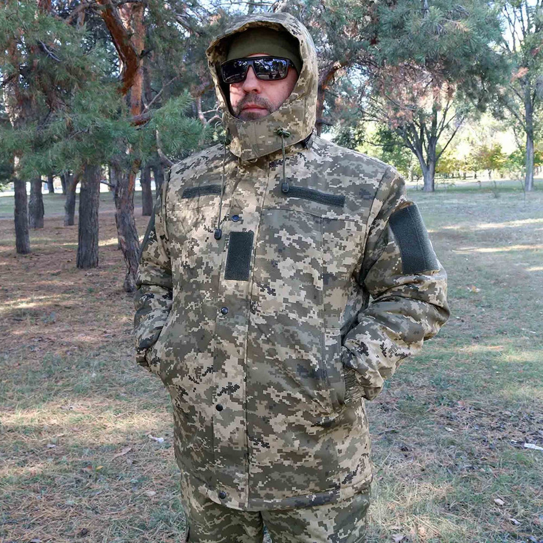 Ukrainian Army winter jacket in MM14 pixel camouflage with adjustable hood and fleece lining, front view.