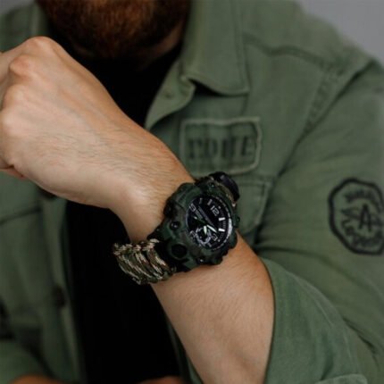 Man Showcasing a Waterproof Watch with Tactical Design