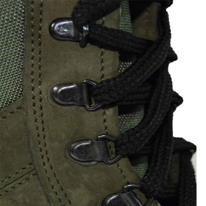 Close-up of olive tactical ankle boots lacing