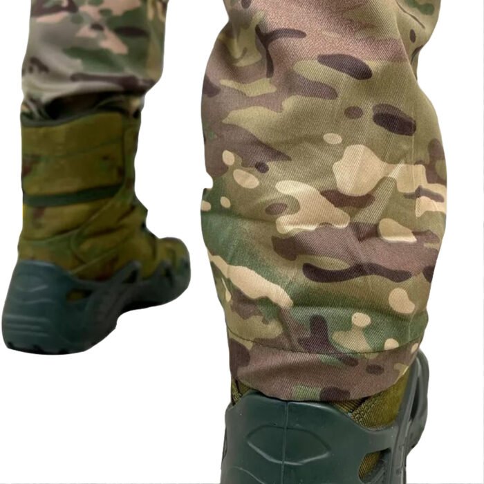 Close-up view of multicam camouflage trousers showcasing the detailed pattern and fabric quality of Ukrainian army gear.