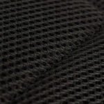 Mesh padding on a black tactical backpack.