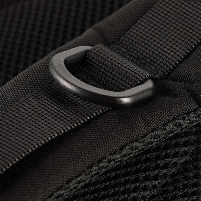 Close-up of the D-ring on a black tactical backpack.