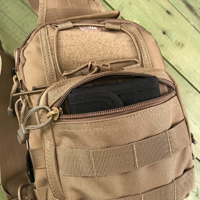 Open coyote tactical chest bag revealing internal pockets