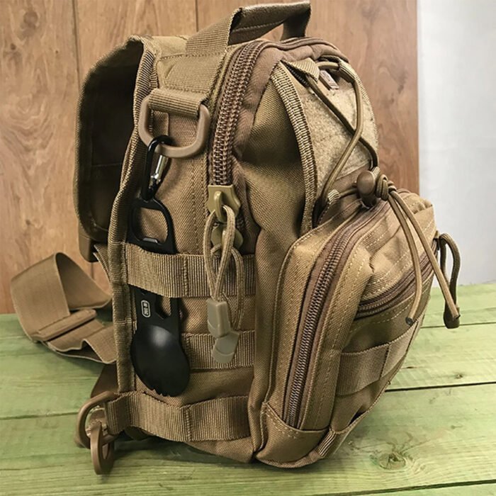 Compact coyote tactical chest bag with external carabiner and multi-compartment design.
