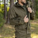 Front view of a hooded olive tactical Gorka jacket, suitable for military and airsoft use