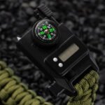 Military wristwatch featuring a digital screen and compass on a tactical strap.