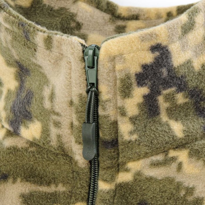 Zipper pull close-up on a tactical camo jacket.