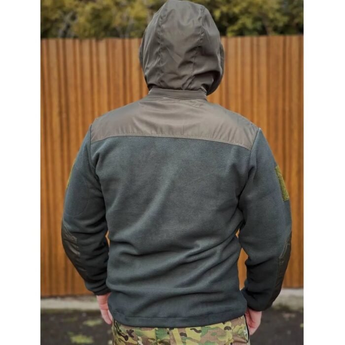 Man wearing a hooded military fleece jacket in olive.