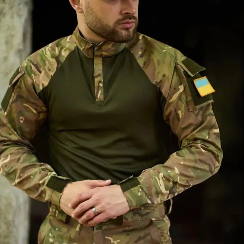 "Front view of a Ukrainian Army UBACS shirt in multicam with a dark green torso.