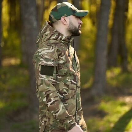 Side view of Ukrainian multicam hooded jacket worn by a soldier, emphasizing the shoulder patch.