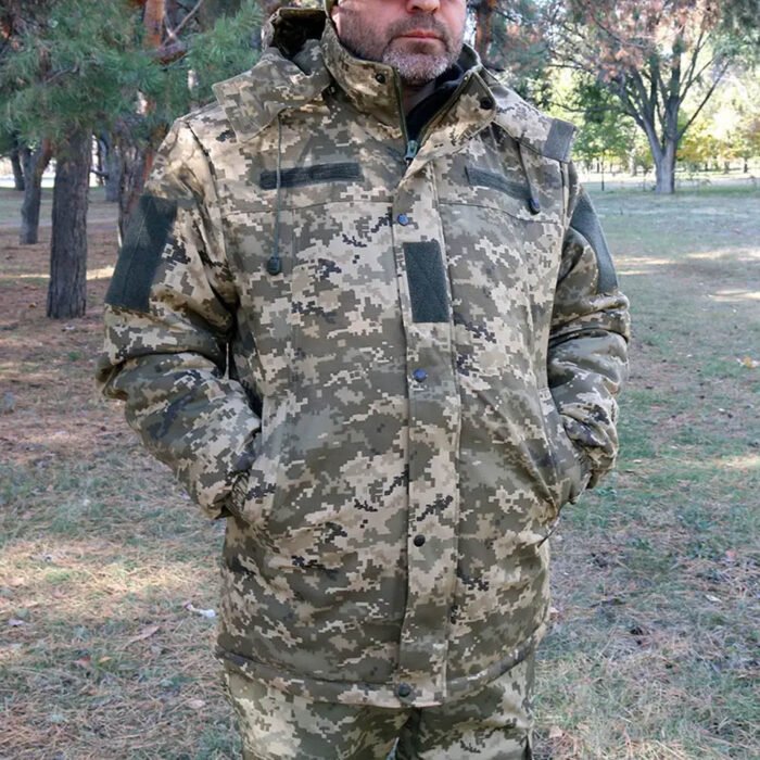 Tactical winter pea coat with pockets and elastic cuffs, angled view showing the coat’s design and details.