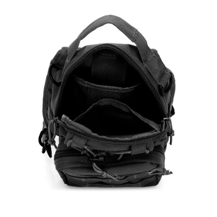 Interior of tactical mini backpack with multiple compartments for organization.