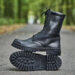 Side view of Ukrainian Army black leather boots with self-cleaning outsoles and reinforced toe caps for military-grade performance.